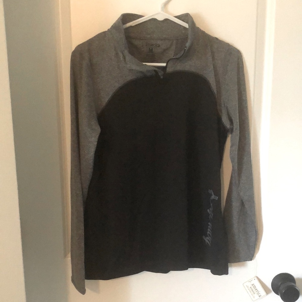 3/4 zip sportswear top.